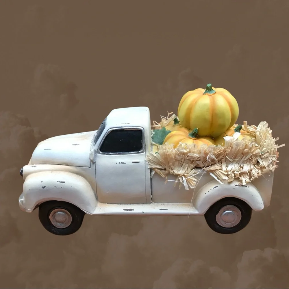 Plow & Hearth in orig.box vintage truck full of pumpkins. Great fall display.